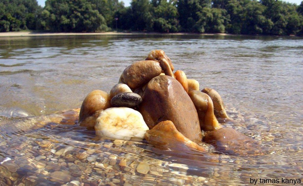 river stones by tamas kanya
