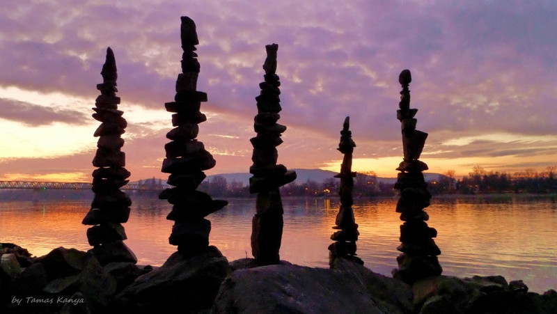 Stone balance art in the sunset by tamas kanya