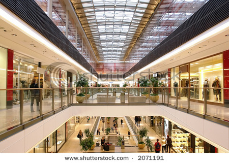 stock-photo-passage-in-multilevel-shopping-mall-2071191