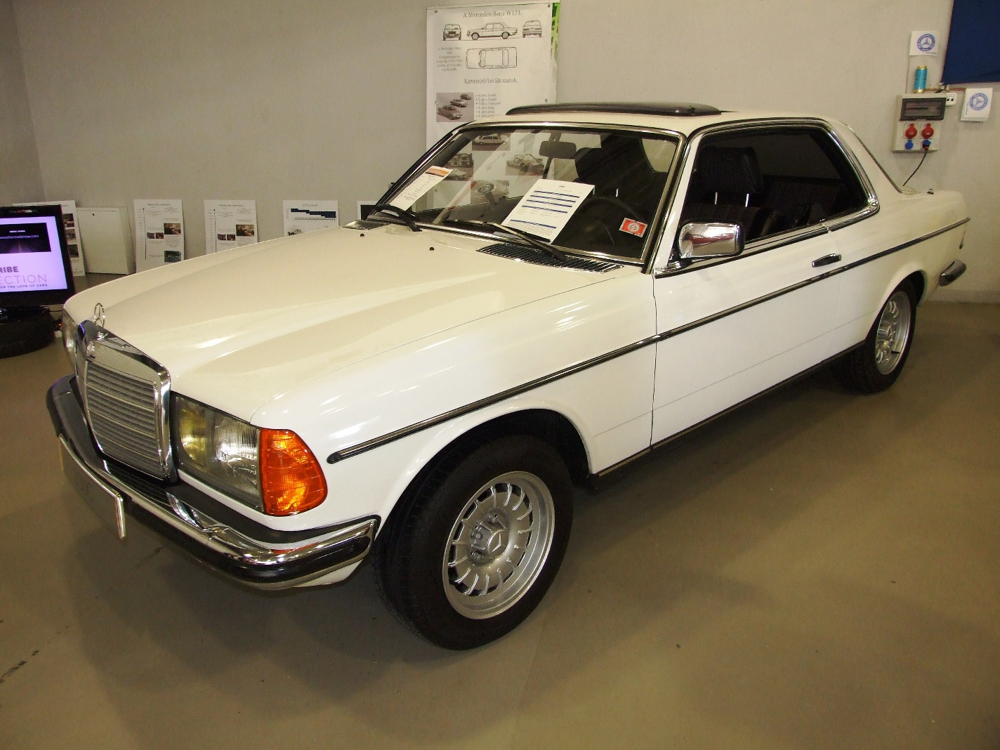 b Mercedes W123 230C c