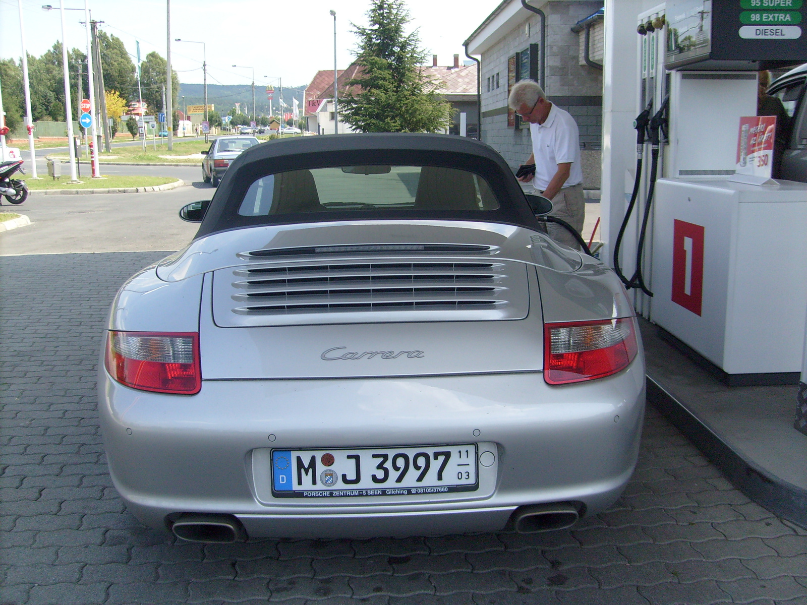 Porsche 911 Carrera Cabriolett (997) & a Tulaj