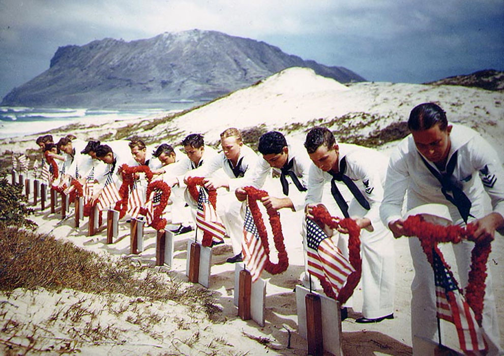 Following Hawaiian tradition, sailors honor men killed during th