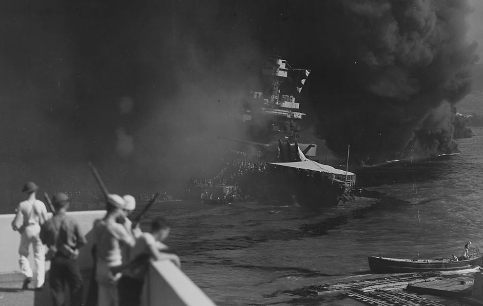 The USS California sinks into the mud of Pearl Harbor on Decembe