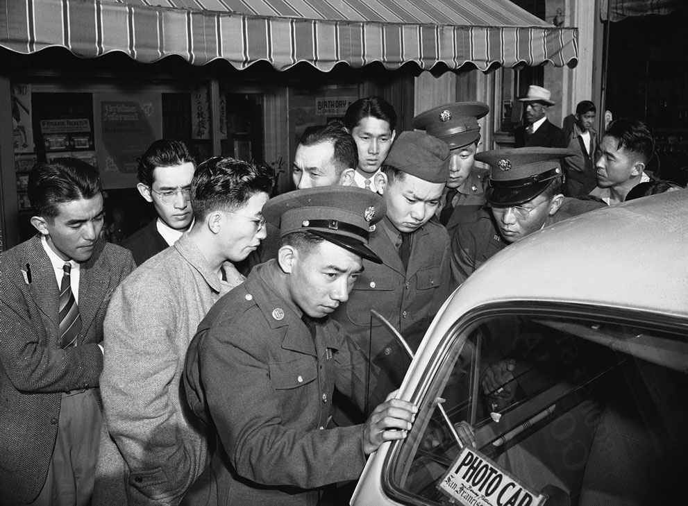 Young Japanese Americans, including several Army selectees, gath