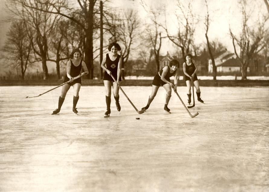 Ice-hockeying women in bathing suits