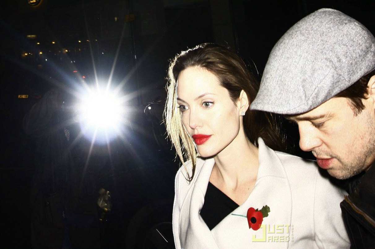 -paparazzi photo angelina jolie brad pitt turns moment relig