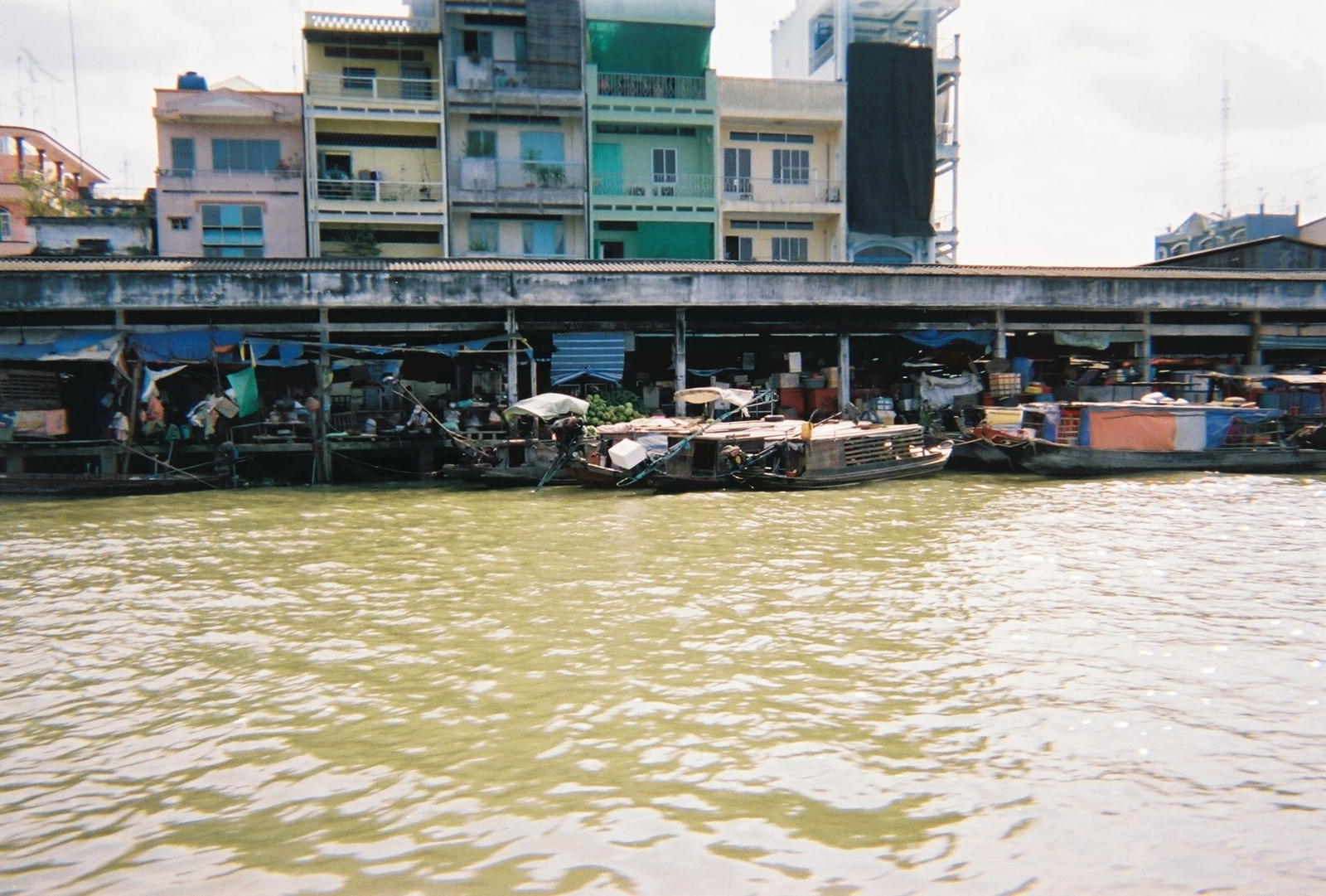 Unloading Products for local market Mekong Delta Vietnam 971345-