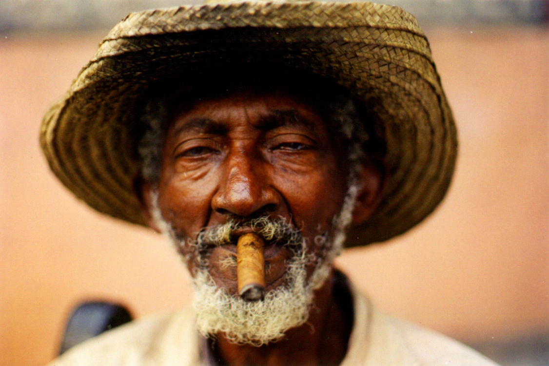 Old Man Smoking by Leonida