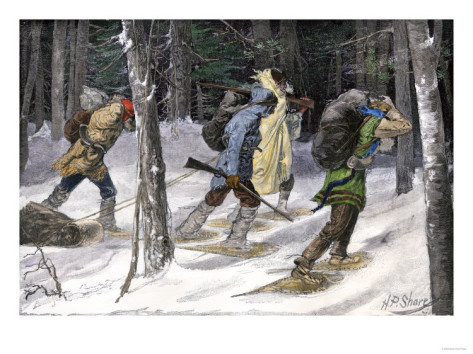 native-american-trappers-carrying-furs-on-snowshoes-in-a-forest-