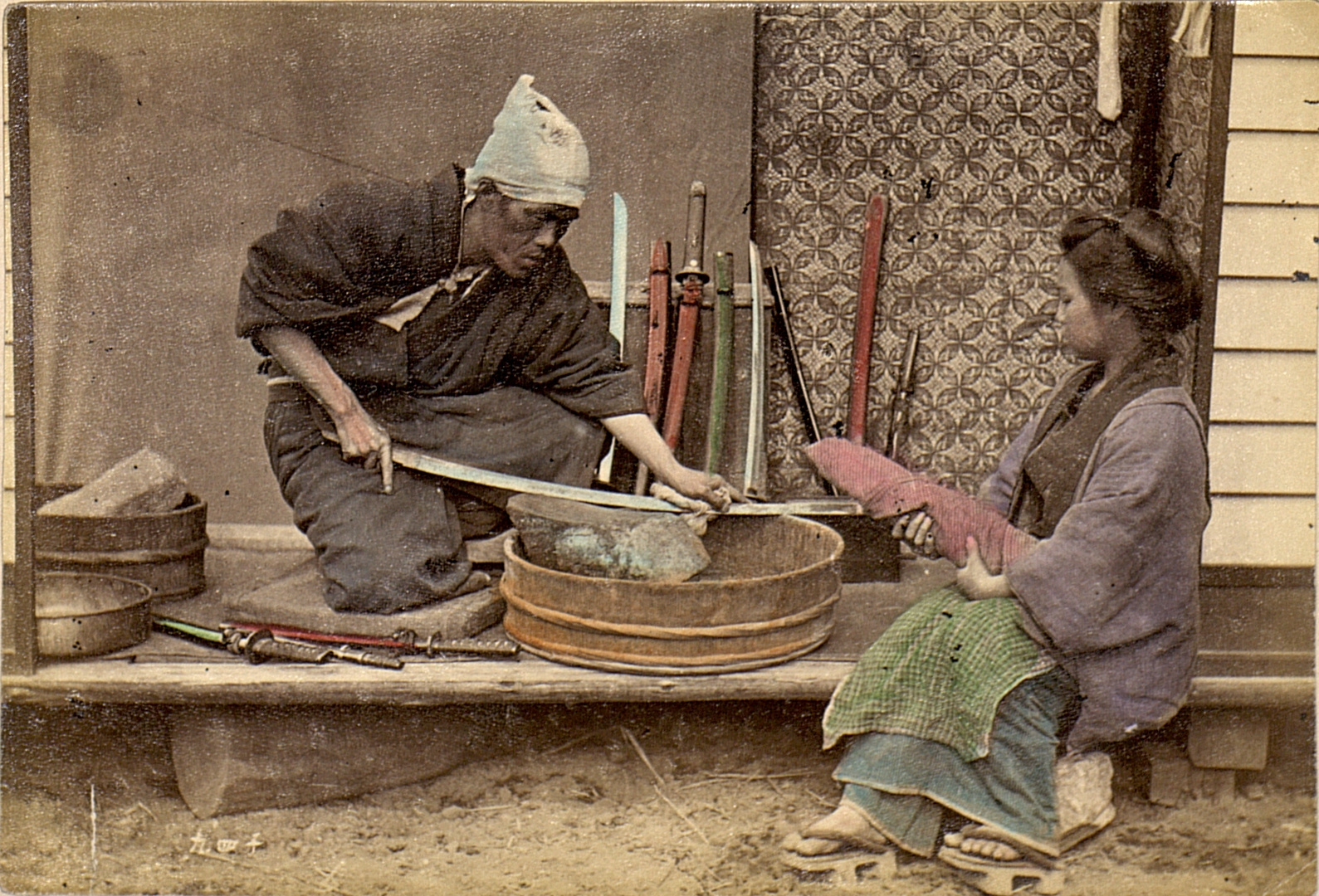 Sword sharpener practicing his trade