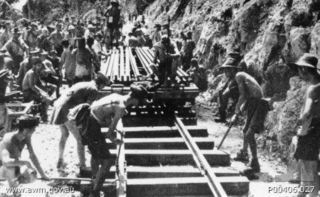 Burma-Thailand Railway. c. 1943. Prisoners of war POWs laying ra