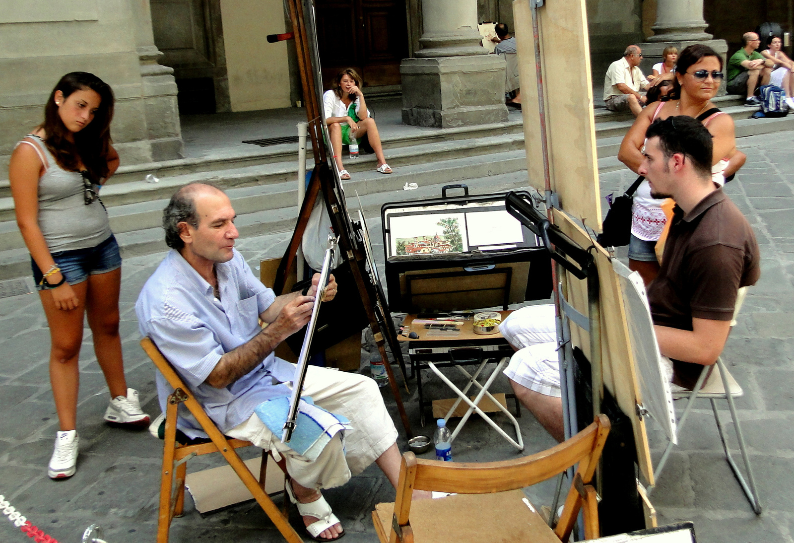 Firenze, utcai festő munkában